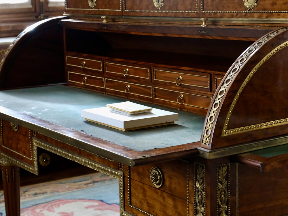 a desk with a book on top of it