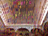 Brightly colored papel picado arranged to create a joyful celebration atmosphere.