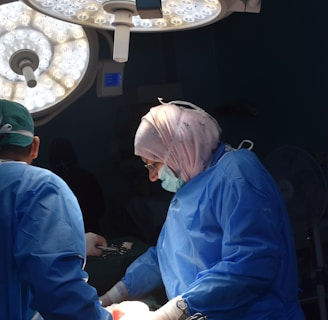 a group of doctors performing surgery on a patient