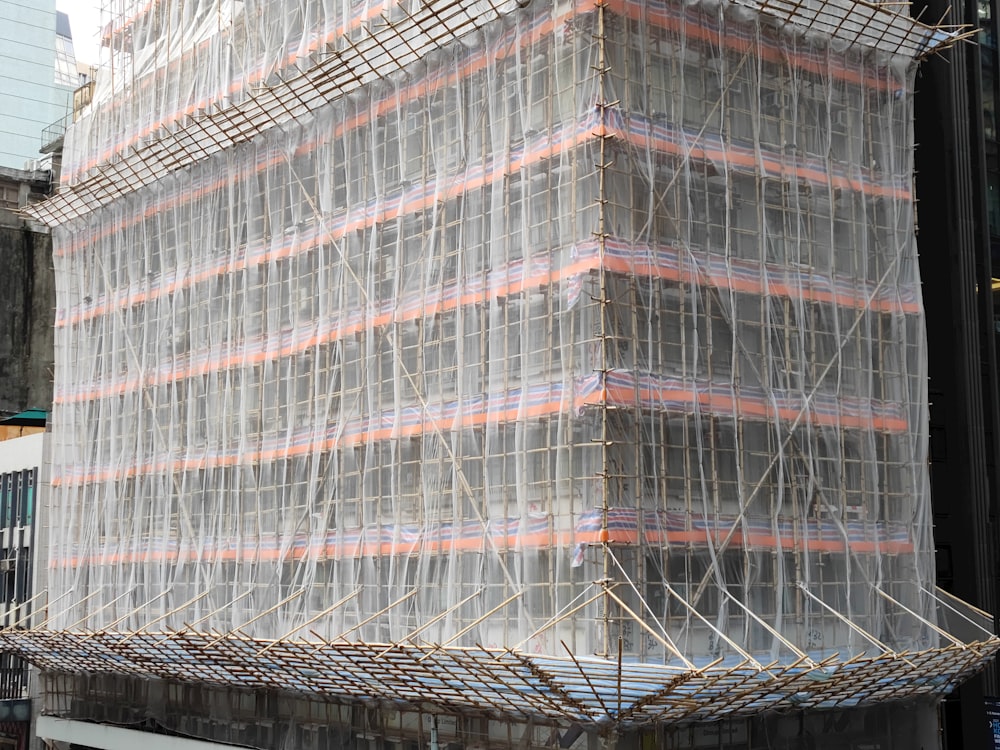 a large building with scaffolding on the side of it