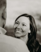Damonda Long engaging warmly with a group during a financial literacy workshop.
