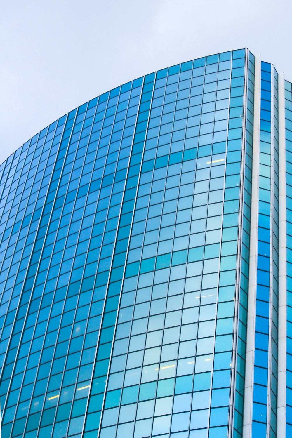 a very tall building with a clock on it's side