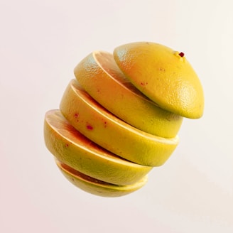 a bunch of oranges stacked on top of each other