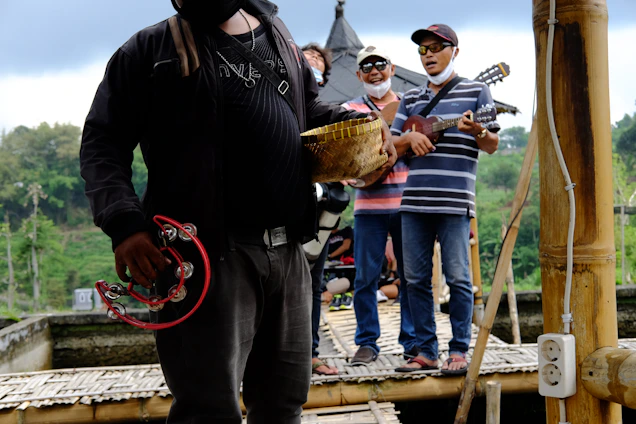 A group of musicians playing traditional choro instruments in a lush Amazonian setting.