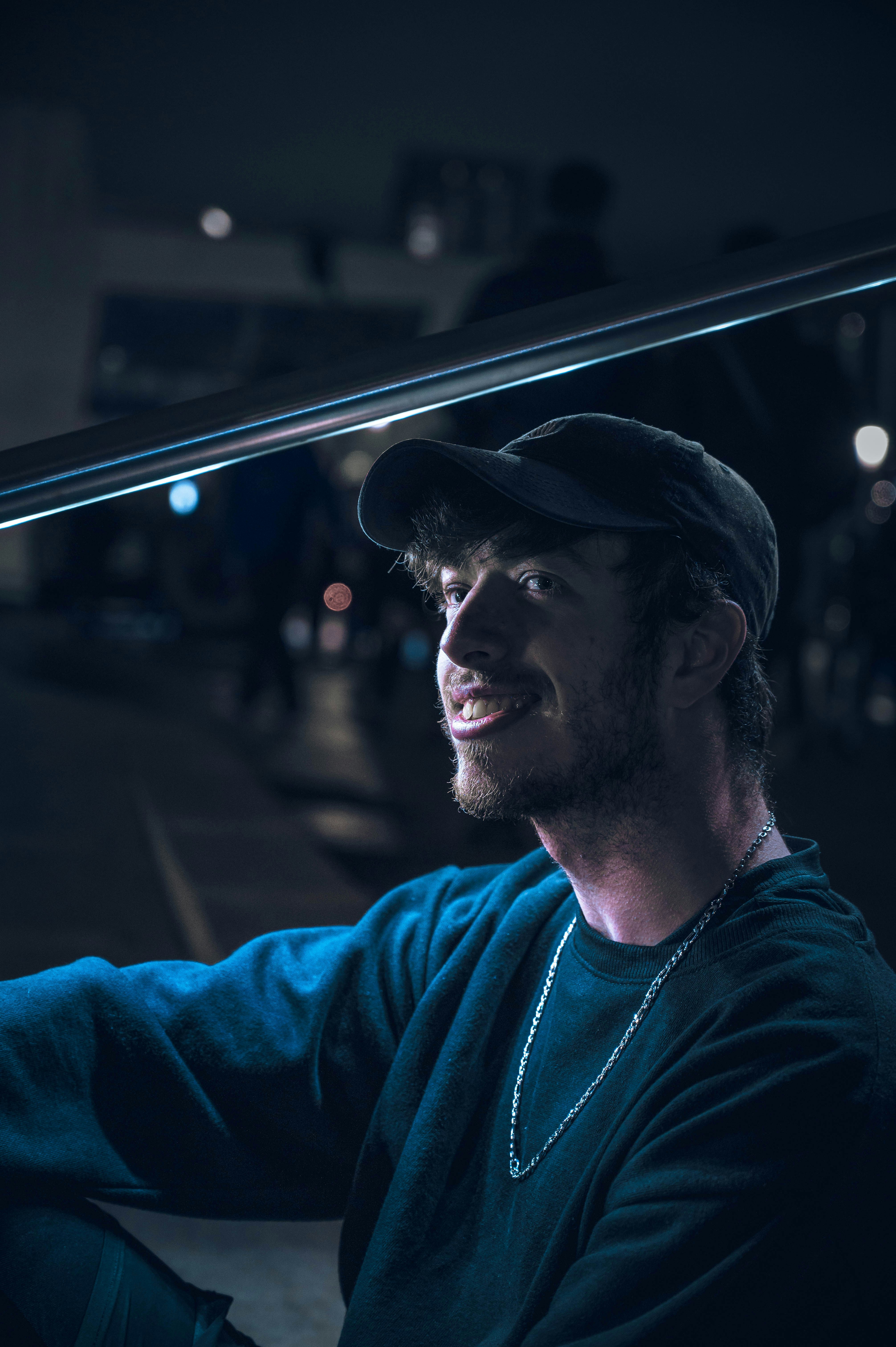 A dark shoot, taken at night with a model. Using only the city light, this image came out perfectly in a nice contrast with blues and black.