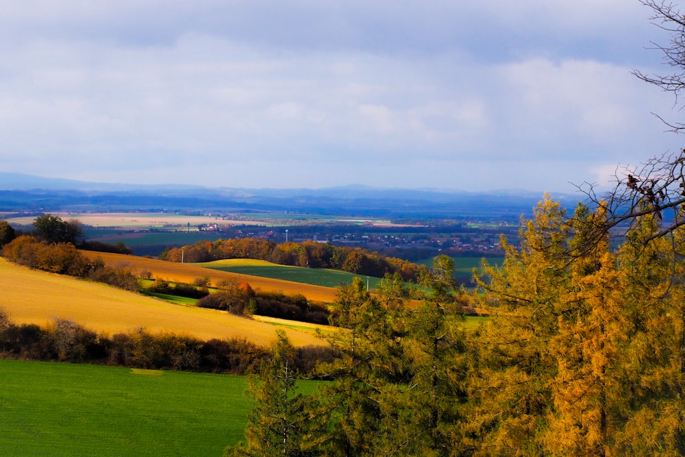 a view of the countryside from a hill