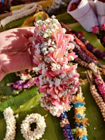 Close-up of intricate floral garlands used in wedding decor.