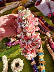 Close-up of intricate floral garlands used in wedding decor.