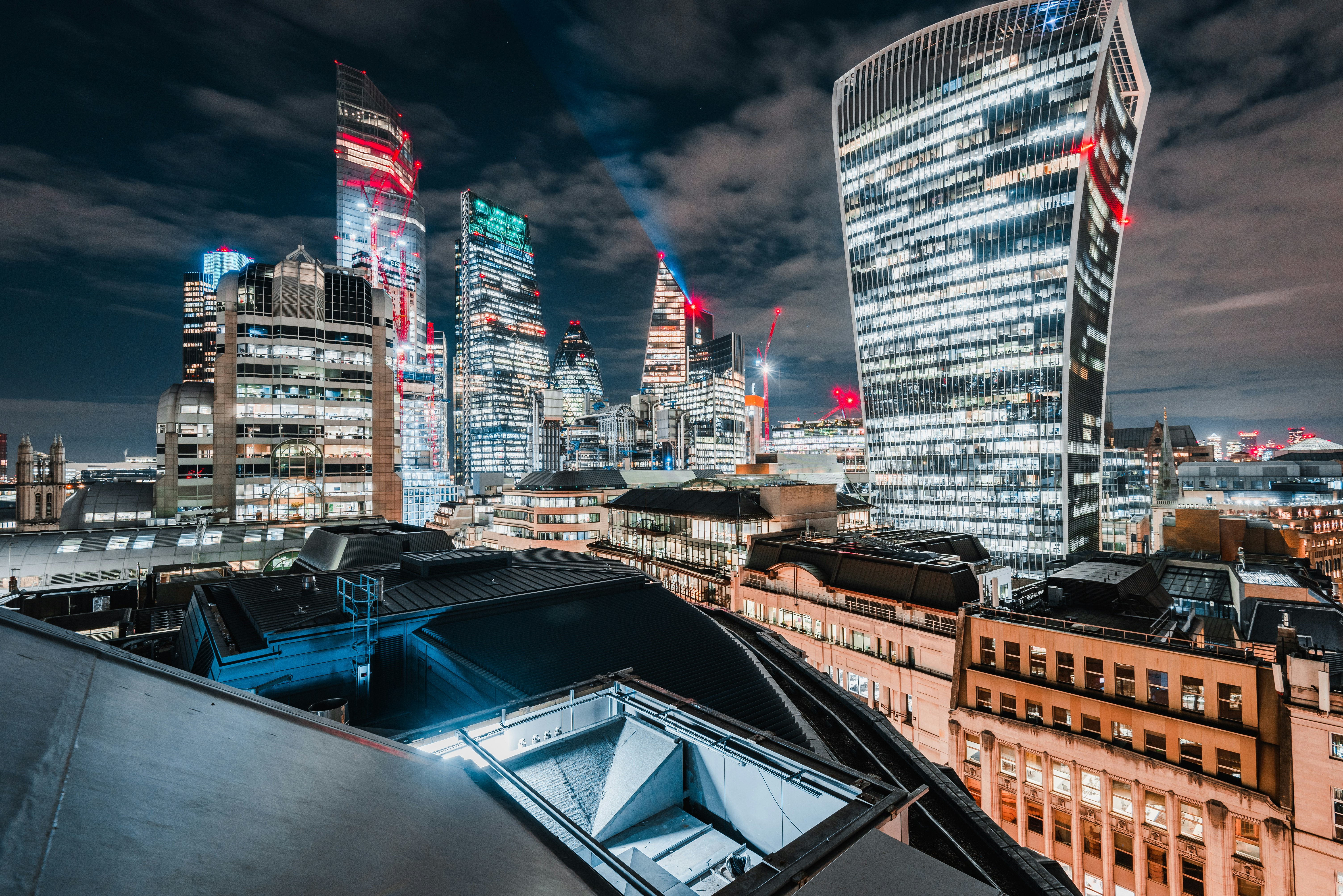 a boat is docked in a city