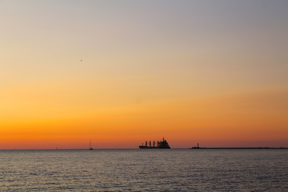 a large ship sailing across a large body of water