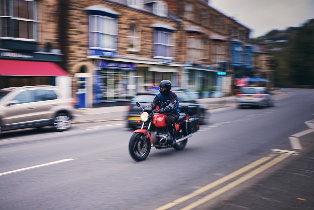 a person riding a motorcycle on a city street