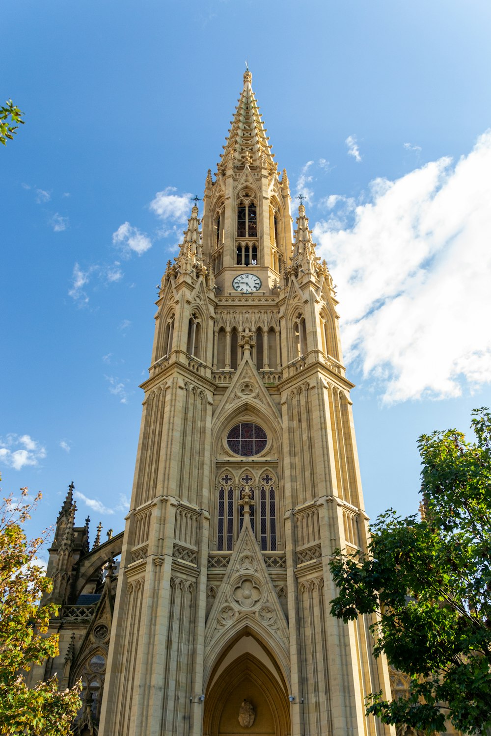 a very tall building with a clock on it's side