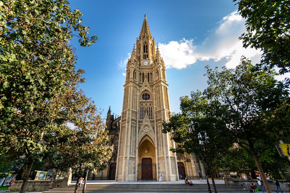 a large cathedral with a clock on the front of it