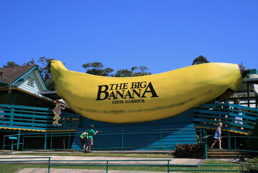 a giant banana sign in front of a building