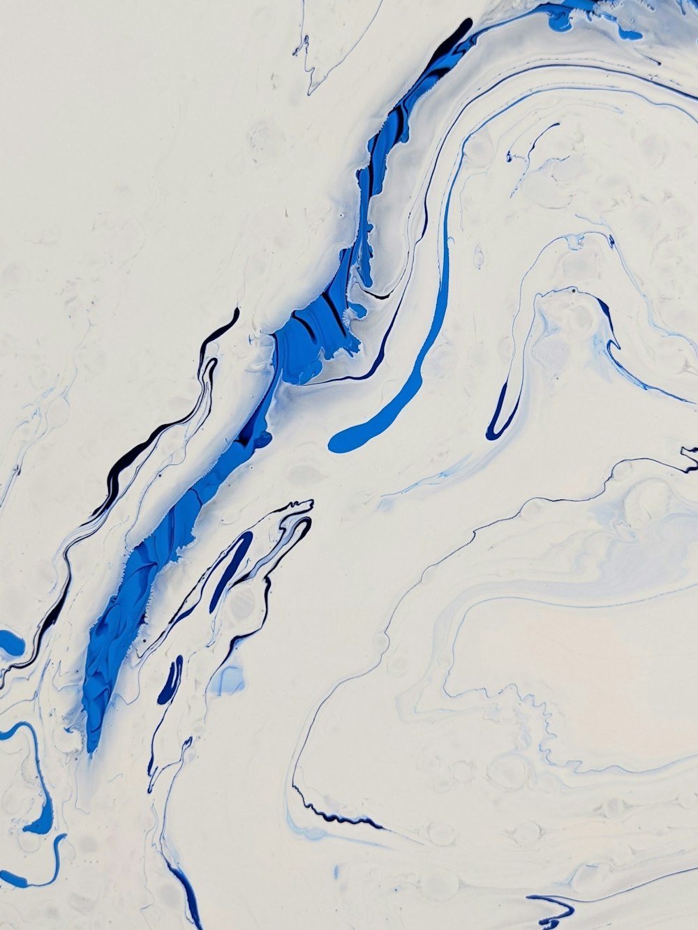 a white and blue painting with black lines