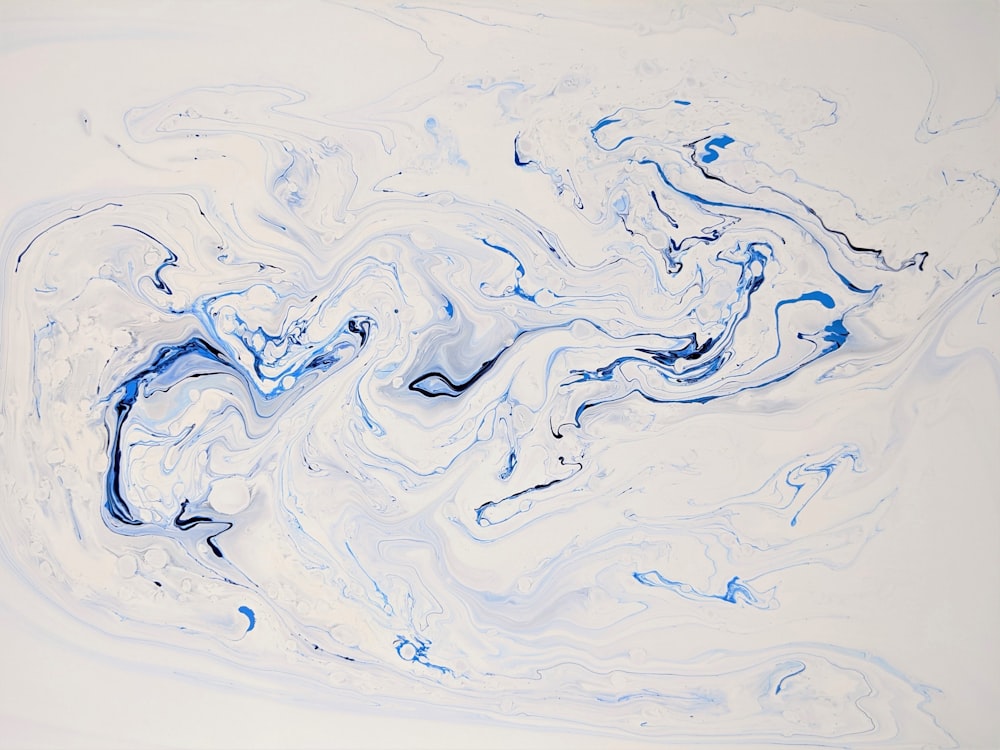 a painting of blue and white paint on a white background