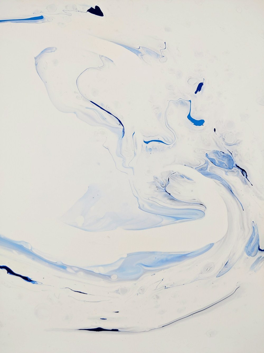 an abstract painting of blue and white colors