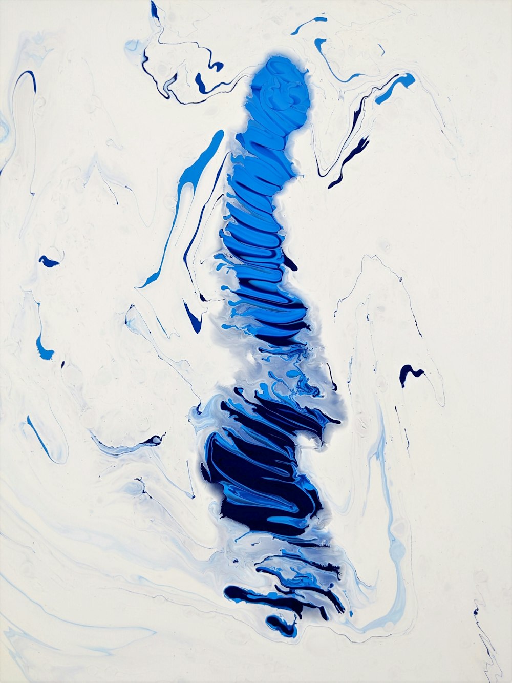 a painting with blue and white colors on a white background