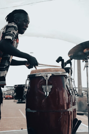 Percussionist playing an African drum