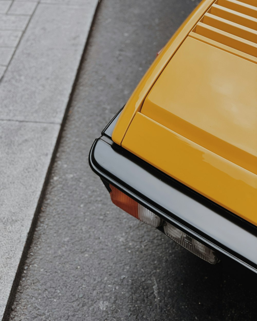 a suitcase sitting on a sidewalk