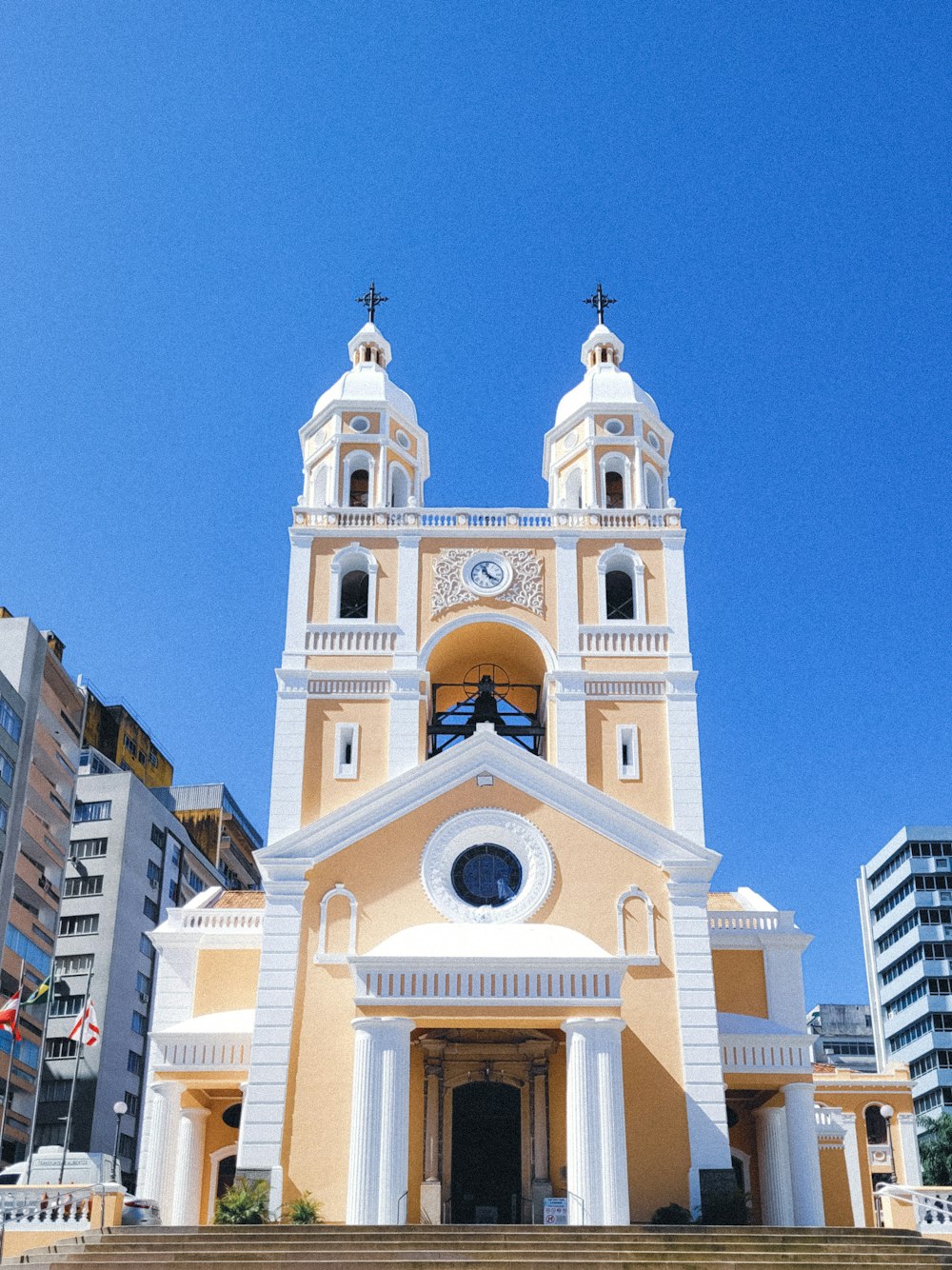 a church with a clock on the front of it