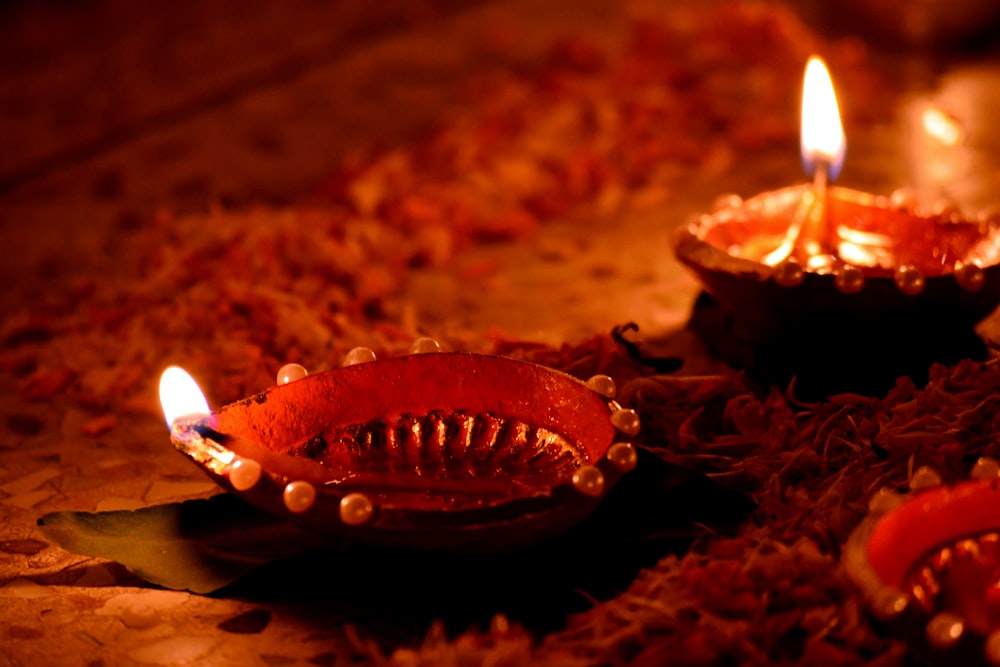 a couple of candles that are on a table