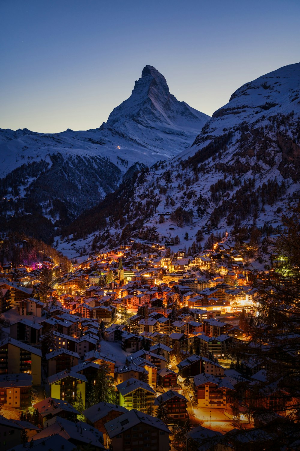 a city with a mountain in the background