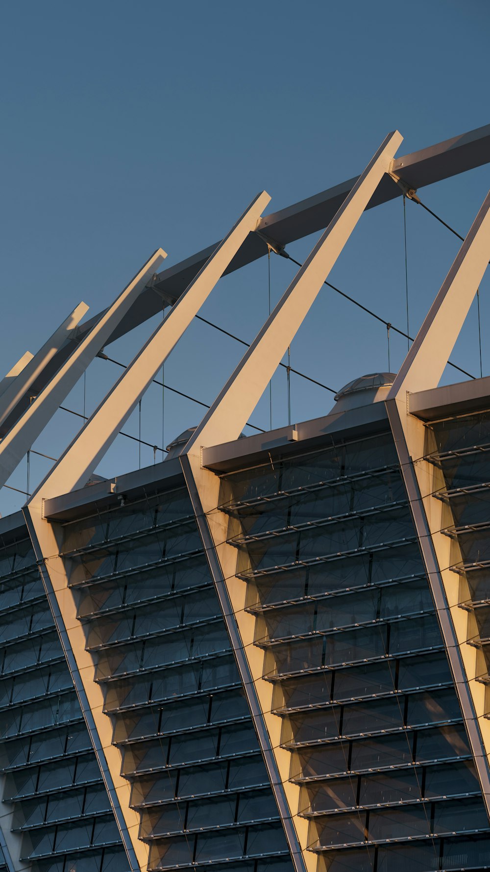 a bird is perched on the roof of a building