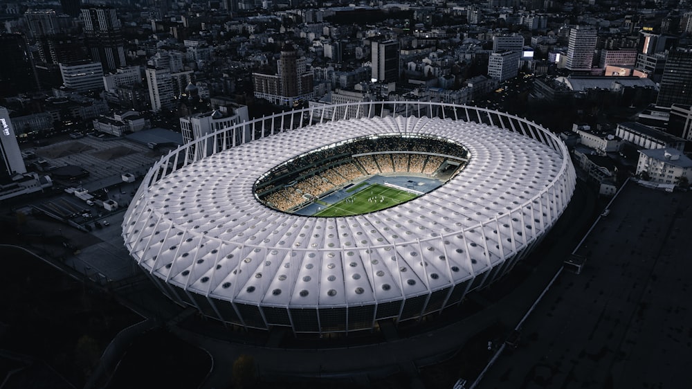 an aerial view of a soccer stadium in a city