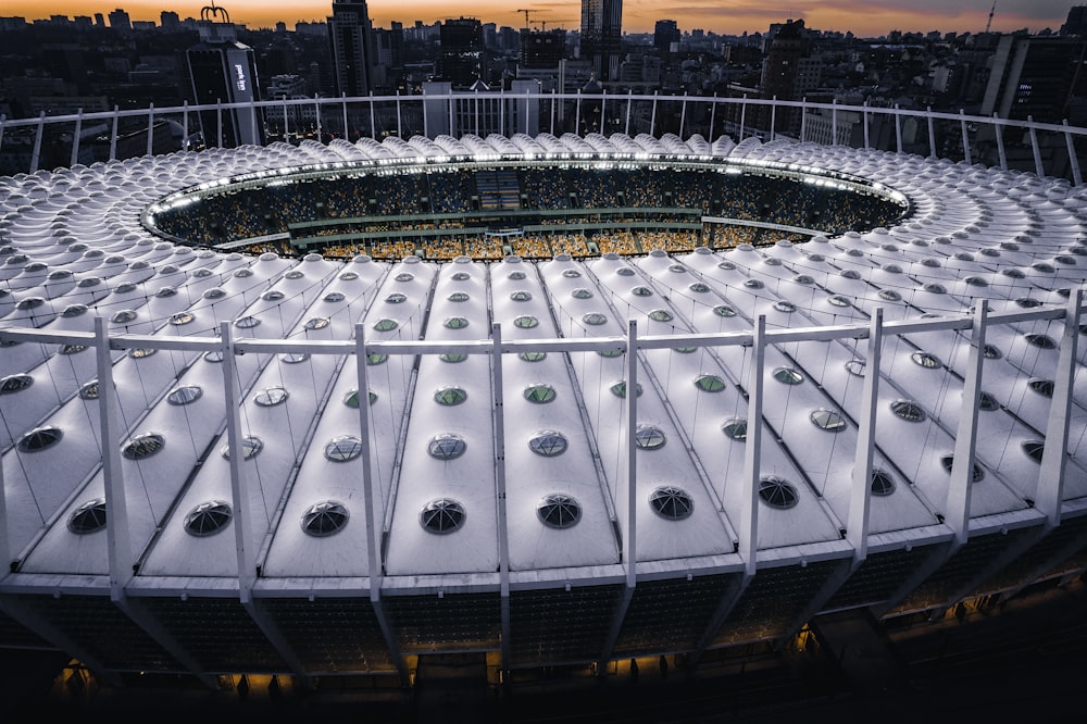 an aerial view of a soccer stadium at dusk