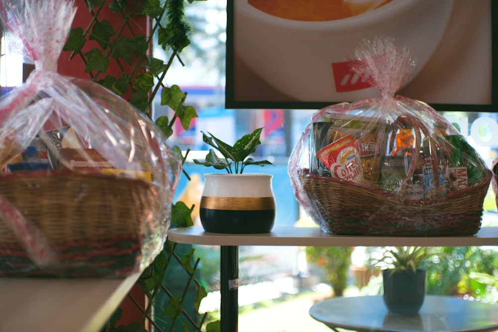 a table with a basket of food and a cup of coffee