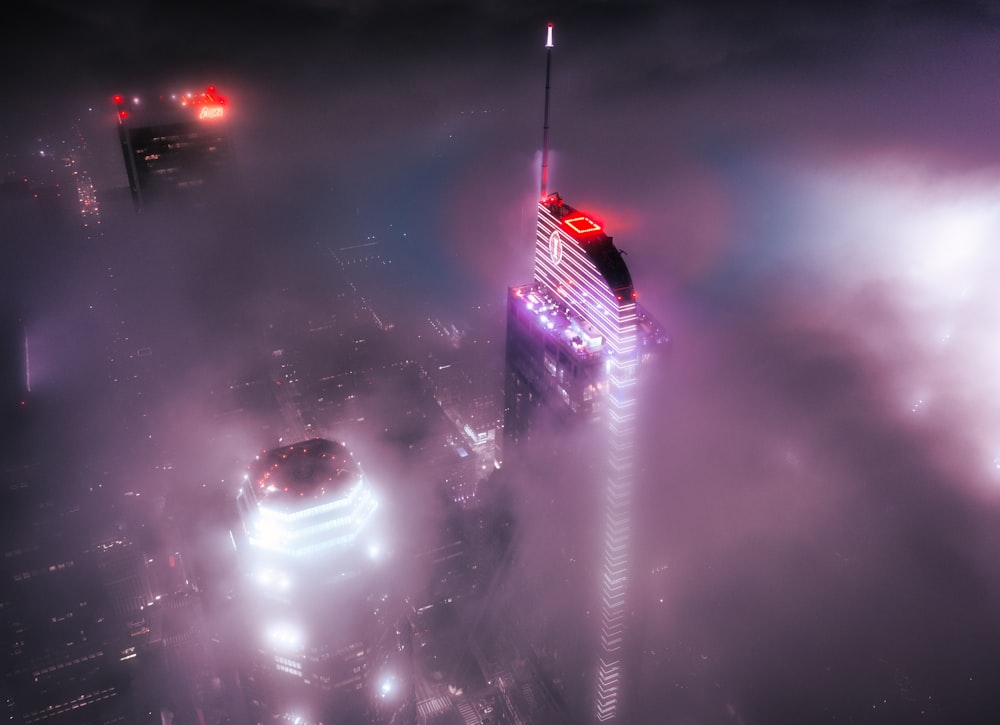 an aerial view of a city in the fog