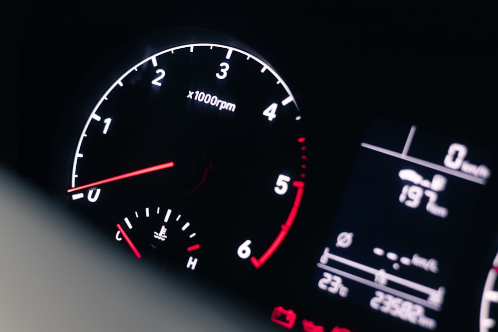 a close up of a speedometer in a car