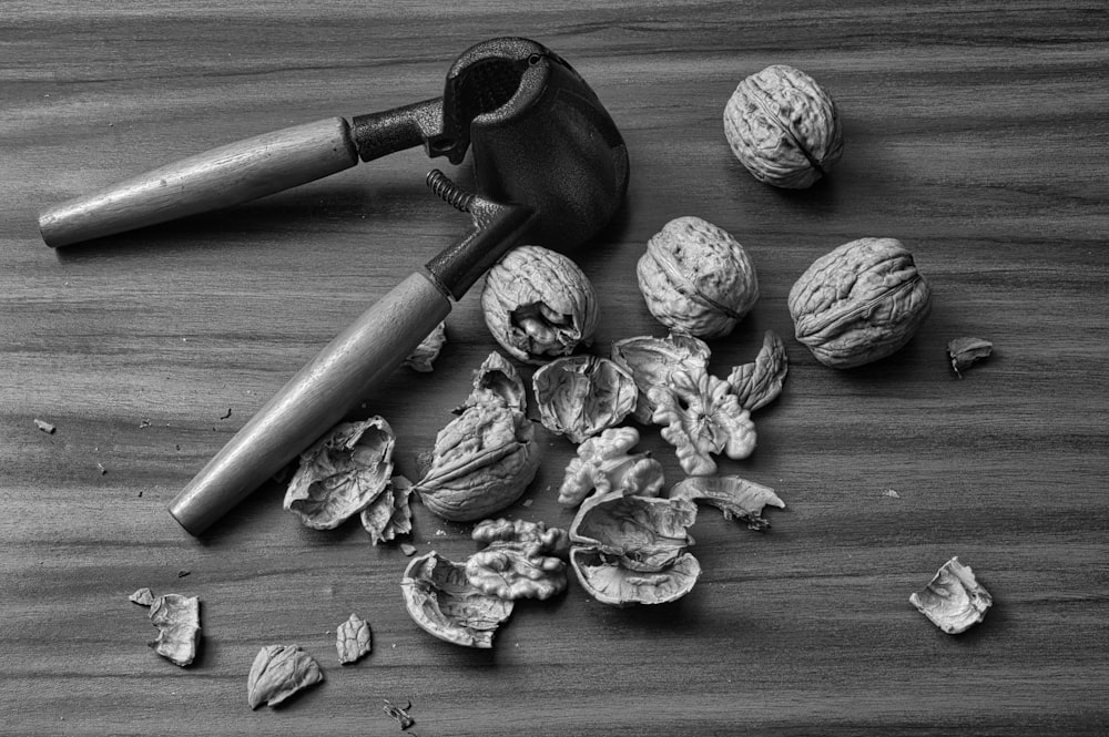 a black and white photo of a bunch of nuts