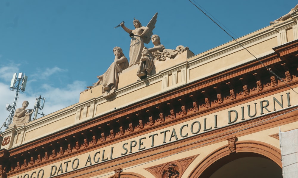 a building with statues on top of it