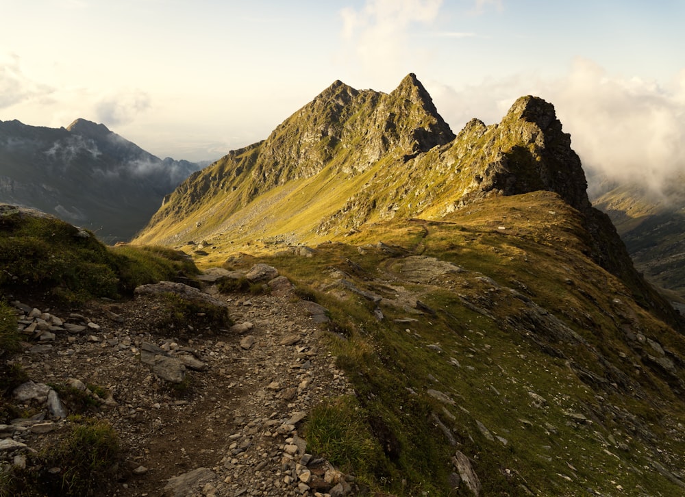 a mountain with a trail going up the side of it