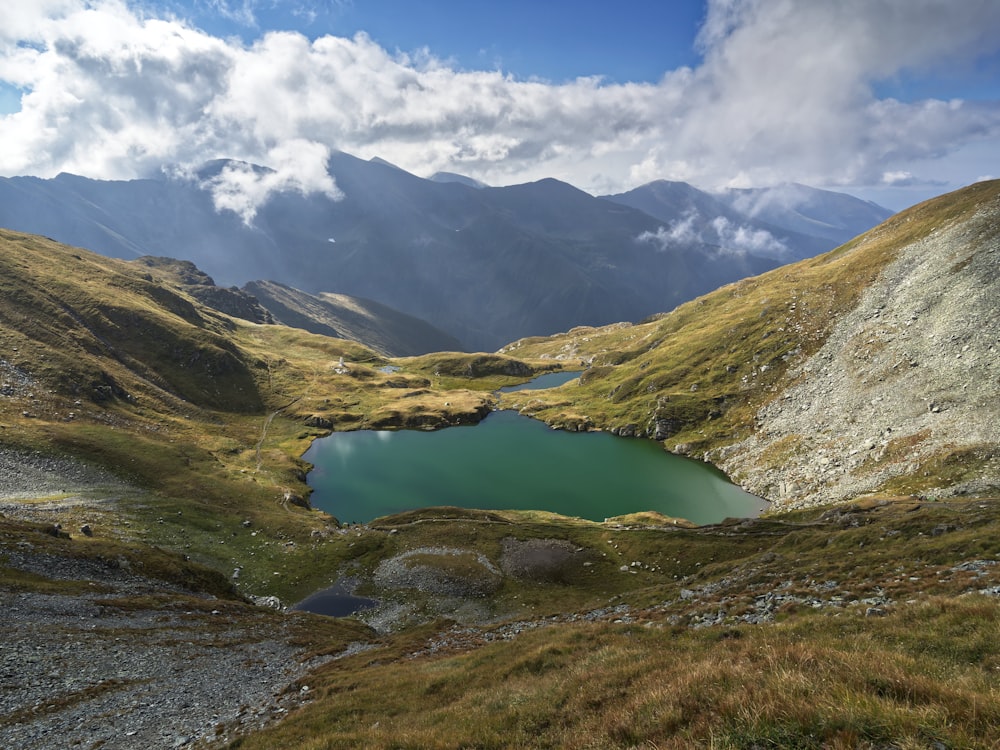 a lake in the middle of a mountain range