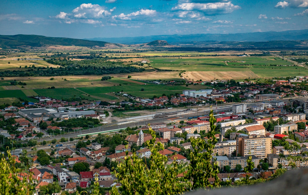 a view of a small town from a hill
