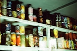 A collection of colorful product packaging on a shelf.