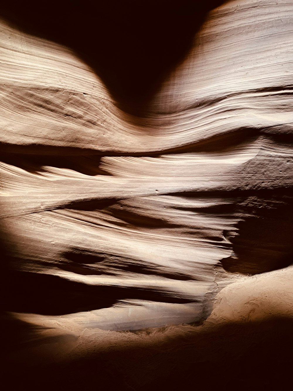 a rock formation in the middle of a desert