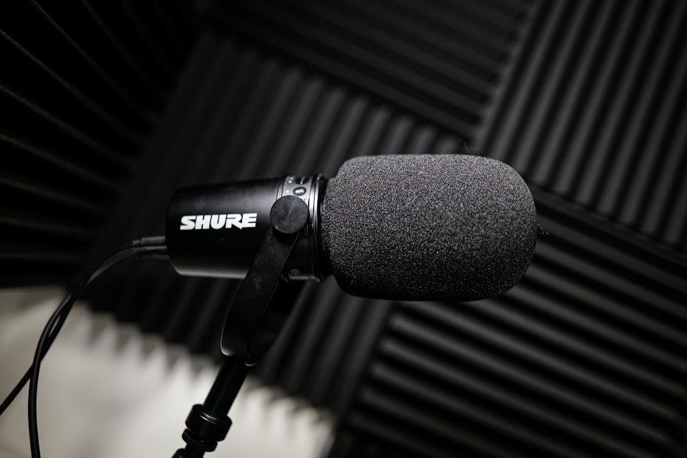 a microphone with a microphone cord attached to it