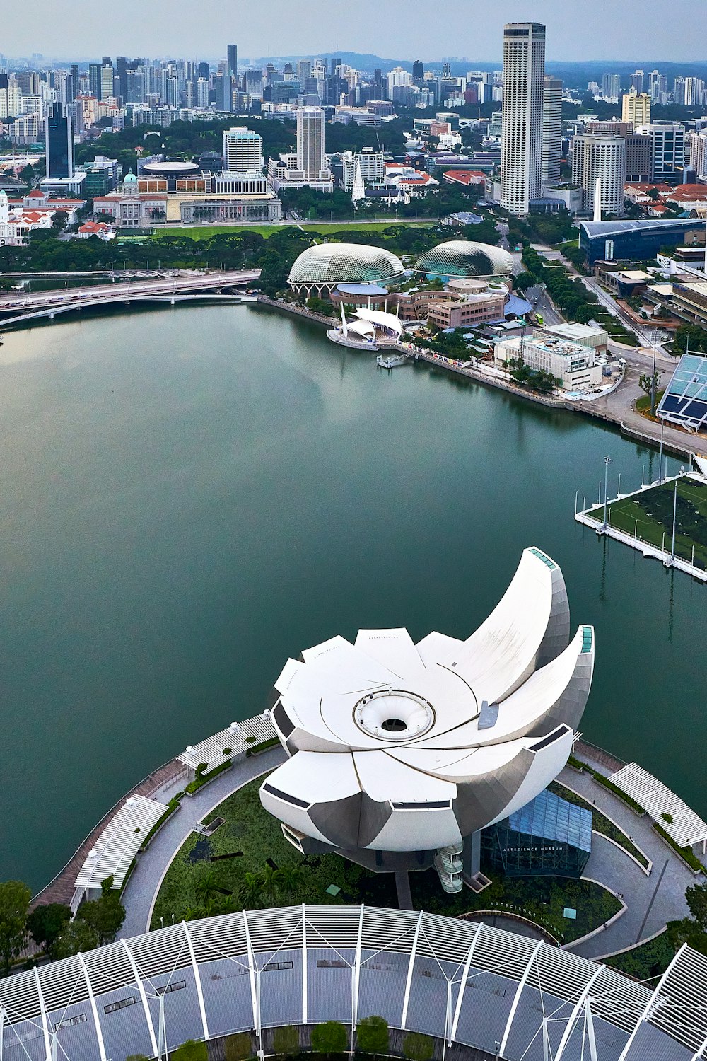 an aerial view of a city and a body of water