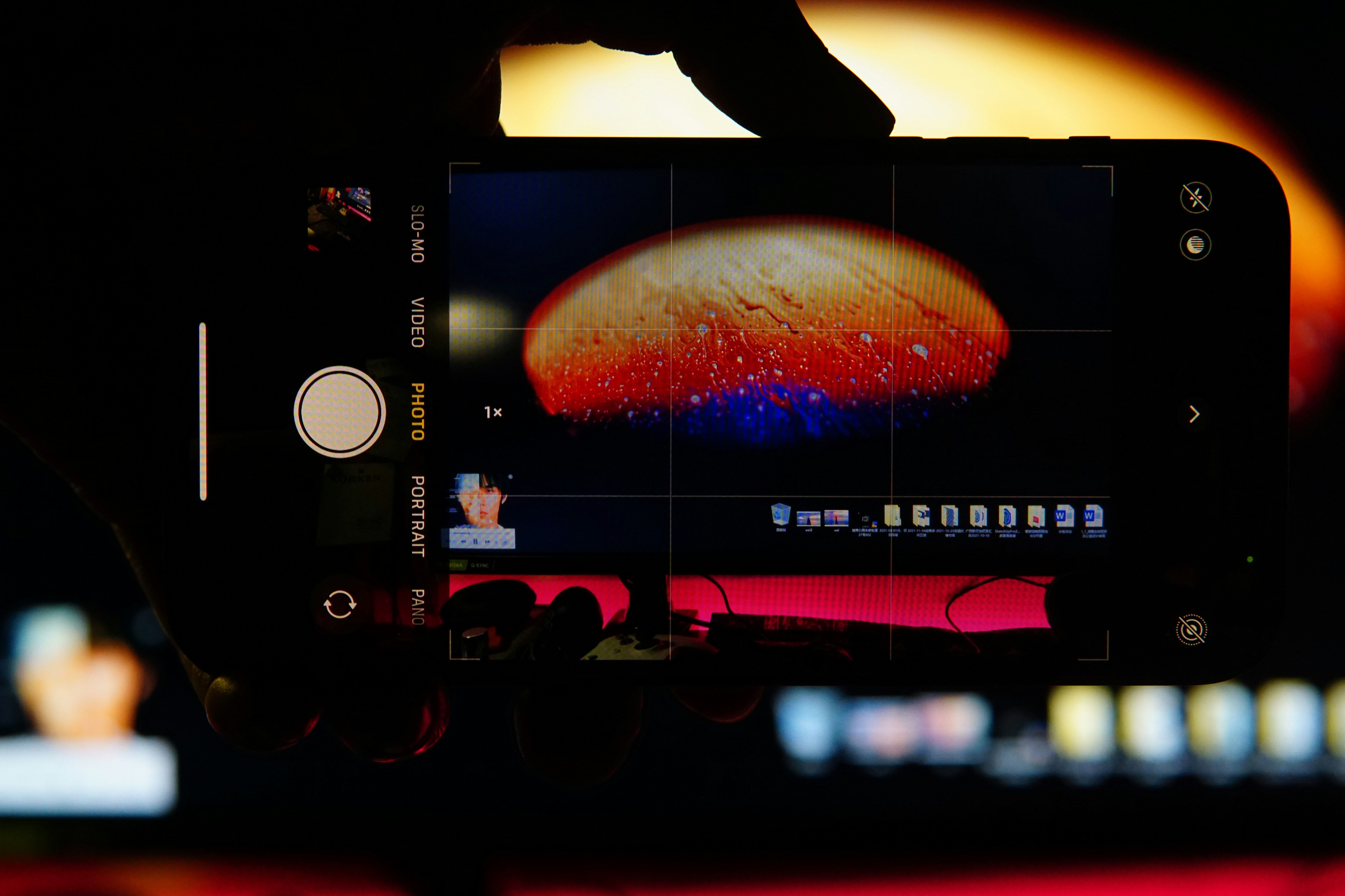 a close up of a person holding a cell phone