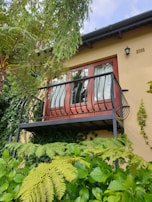 Aluminum rail cover installed on a residential balcony sliding door.