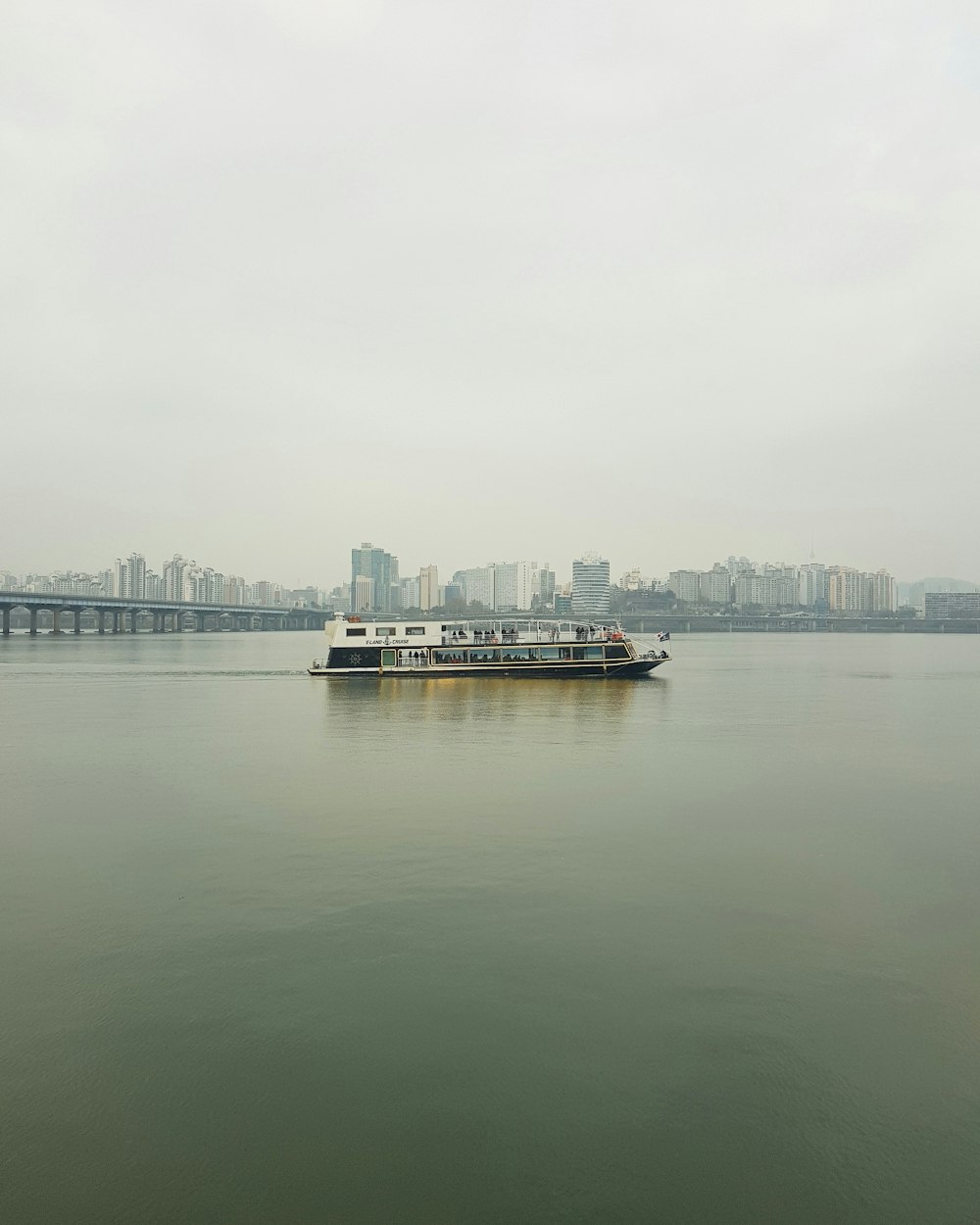 a large boat floating on top of a large body of water