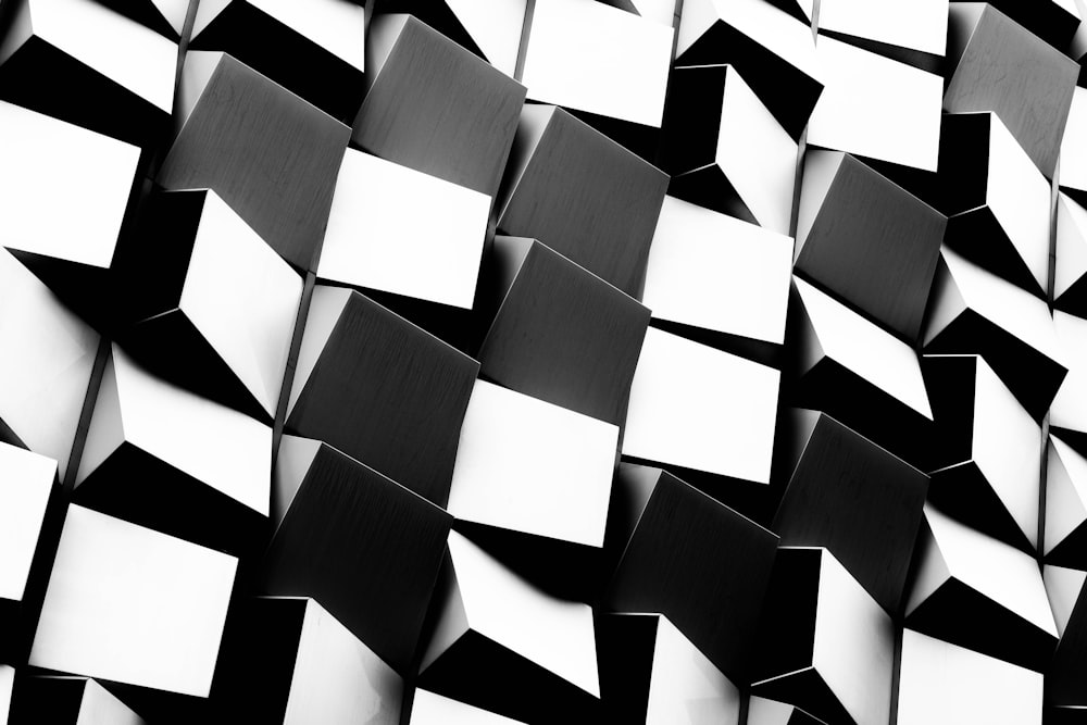 a black and white photo of a bunch of cubes