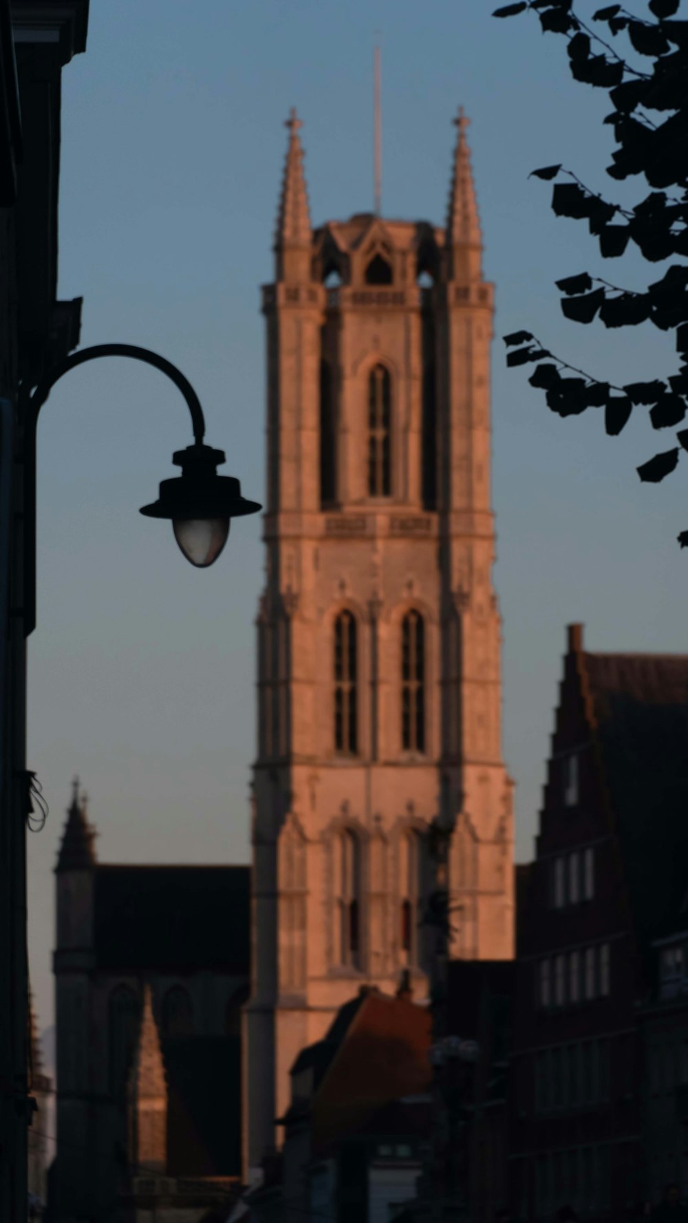 a tall building with a clock on the front of it