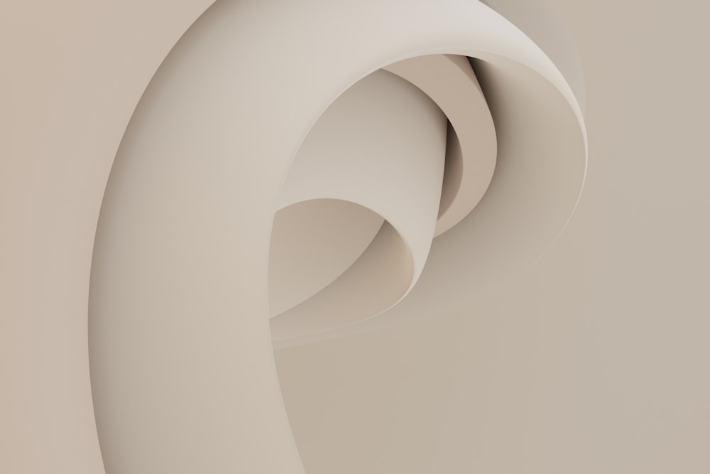 um close up de um objeto branco em uma parede