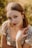 a woman in a dress posing for a picture