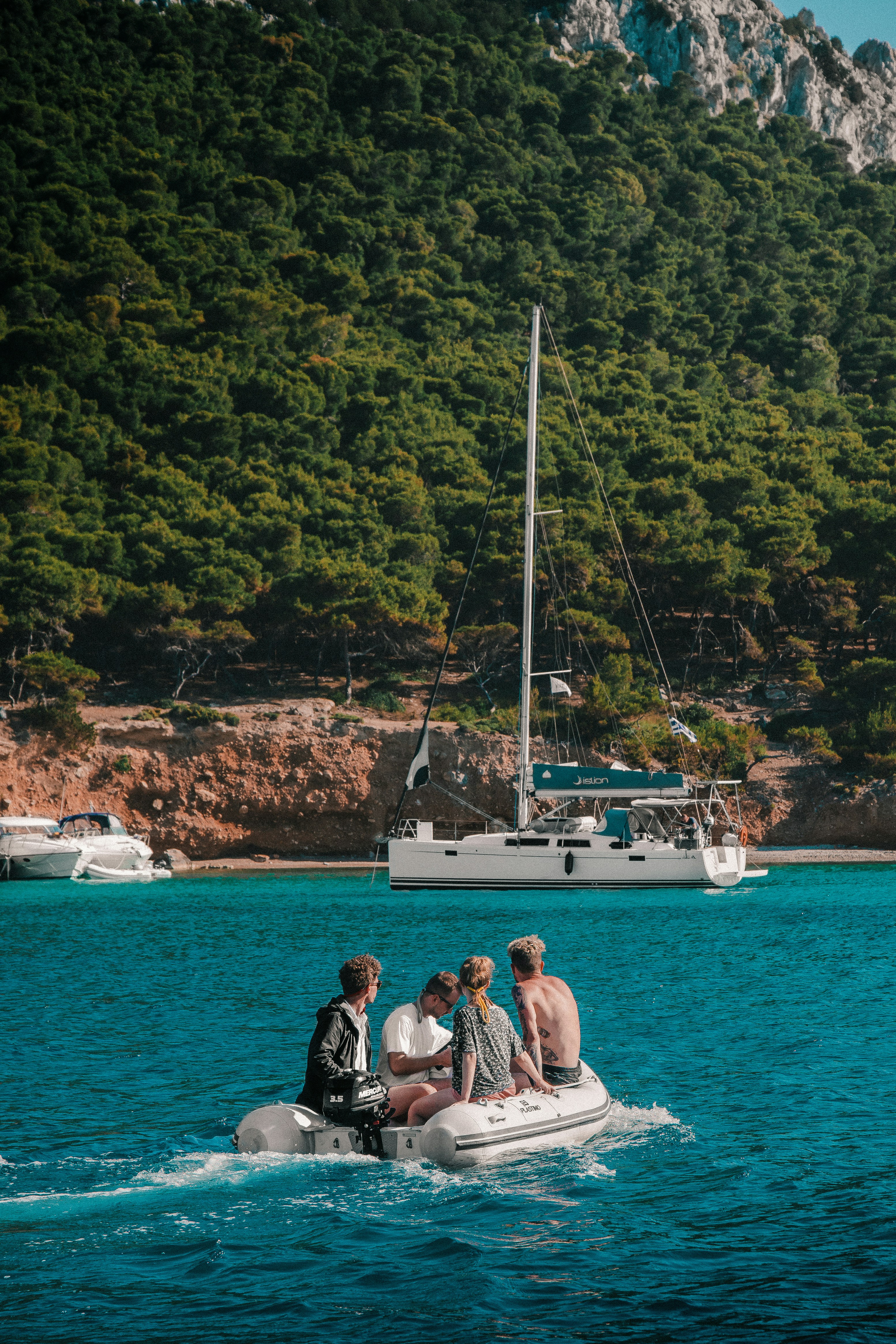 a group of people swimming in a body of water